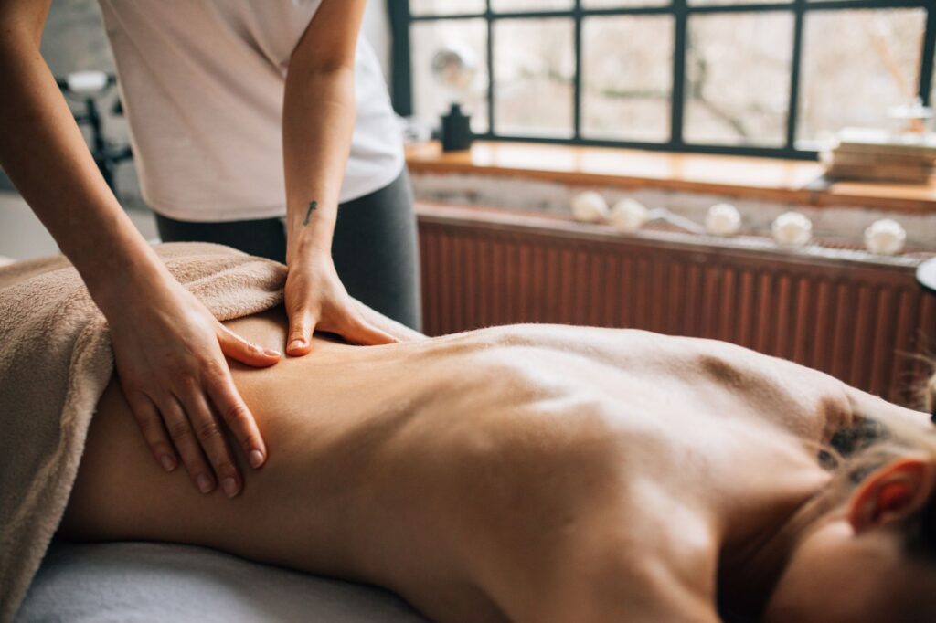 Private massage therapy room with closed door
